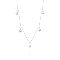 Delicate adjustable white pearl necklace, perfect for layering or as a standalone elegant piece.