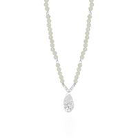 Elegant moonstone and silver hammered teardrop pendant with a timeless and sophisticated design.