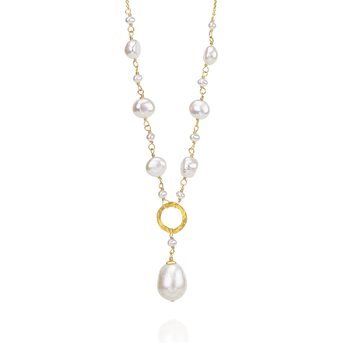 Stylish Y-shaped necklace featuring a hammered circle pendant and lustrous pearl accent, perfect for adding a modern touch to any outfit.