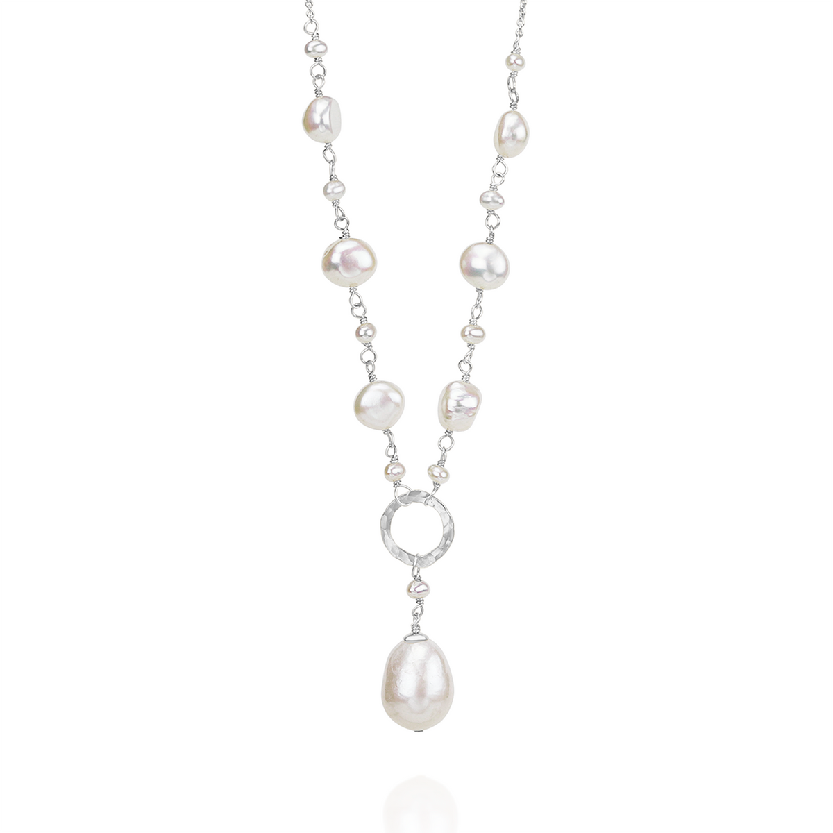 Elegant Y-shaped necklace featuring a hammered circle pendant and a pearl accent, perfect for adding a chic and modern touch to any look.