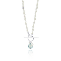 Pearl and gemstone toggle necklace featuring an elegant design with lustrous pearls and vibrant gemstones, perfect for adding a sophisticated touch to any outfit.