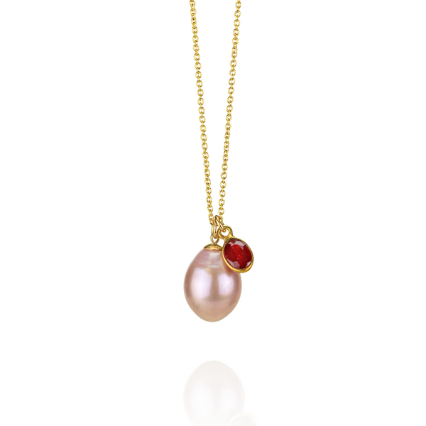 Elegant pink pearl and ruby pendant necklace set in gold, featuring a delicate design perfect for timeless elegance.