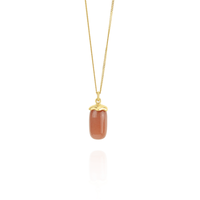 Smooth capsule pendant necklace, featuring a sleek, modern design perfect for adding a stylish and minimalist touch to any outfit.