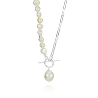 White pearl and paperclip chain toggle necklace, featuring an elegant design with pearls and a modern toggle clasp, perfect for a sophisticated, contemporary look.